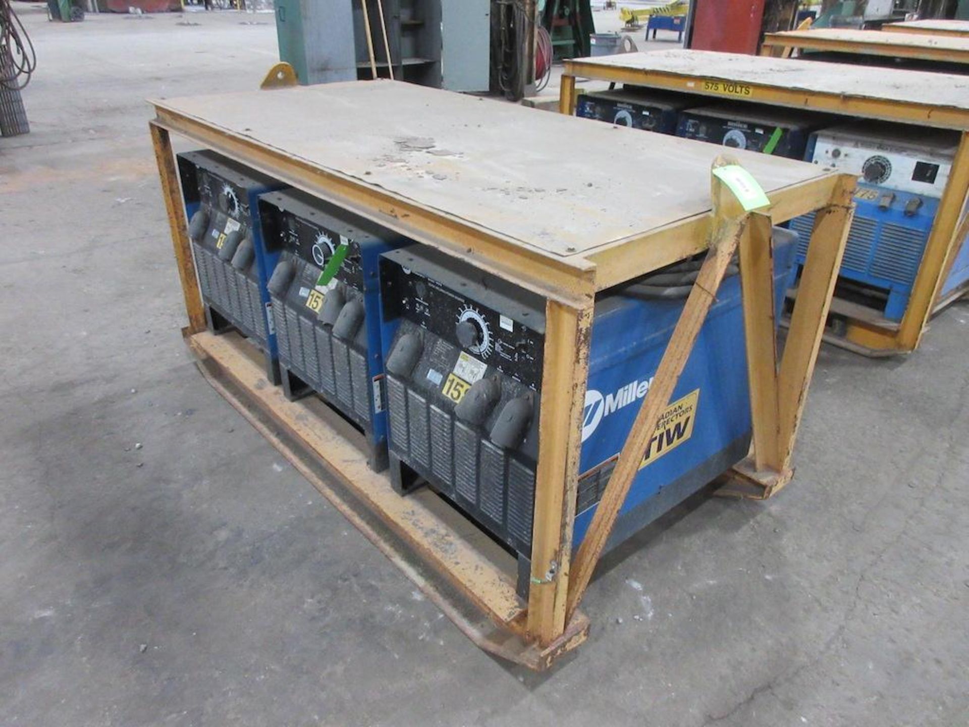 (3) SET OF MILLER SRH-444 CC DC WELDING POWER SOURCES, ALL 3 BOLTED TO STEEL SKID FRAME MEASURING: 8