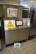 A HOSHIZAKI Model IM-240DNE-32 Commercial Ice Making Machine, Serial No. H00583D mounted on a