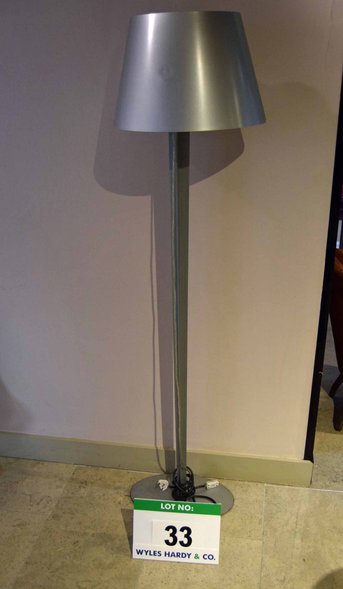 A Silver Painted Steel Standard Lamp