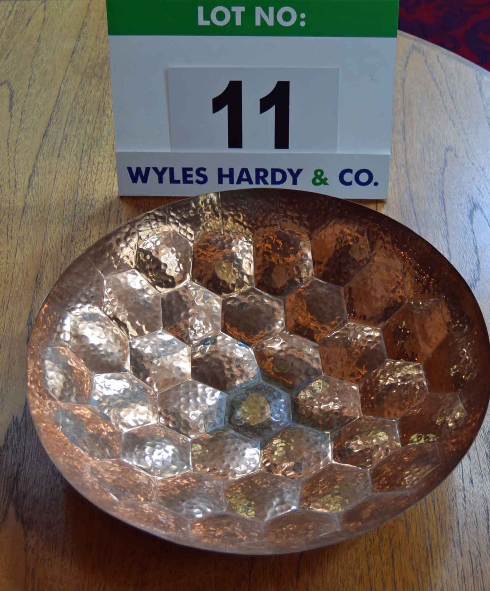 A TOM DIXON 385mm dia. Beaten Copper Hex Bowl