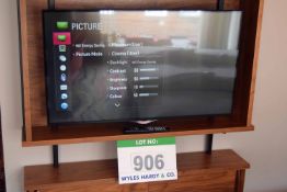 An LG 42UB820V 42 inch Smart Television Set on Articulated Wall Bracket with Hand Held Remote