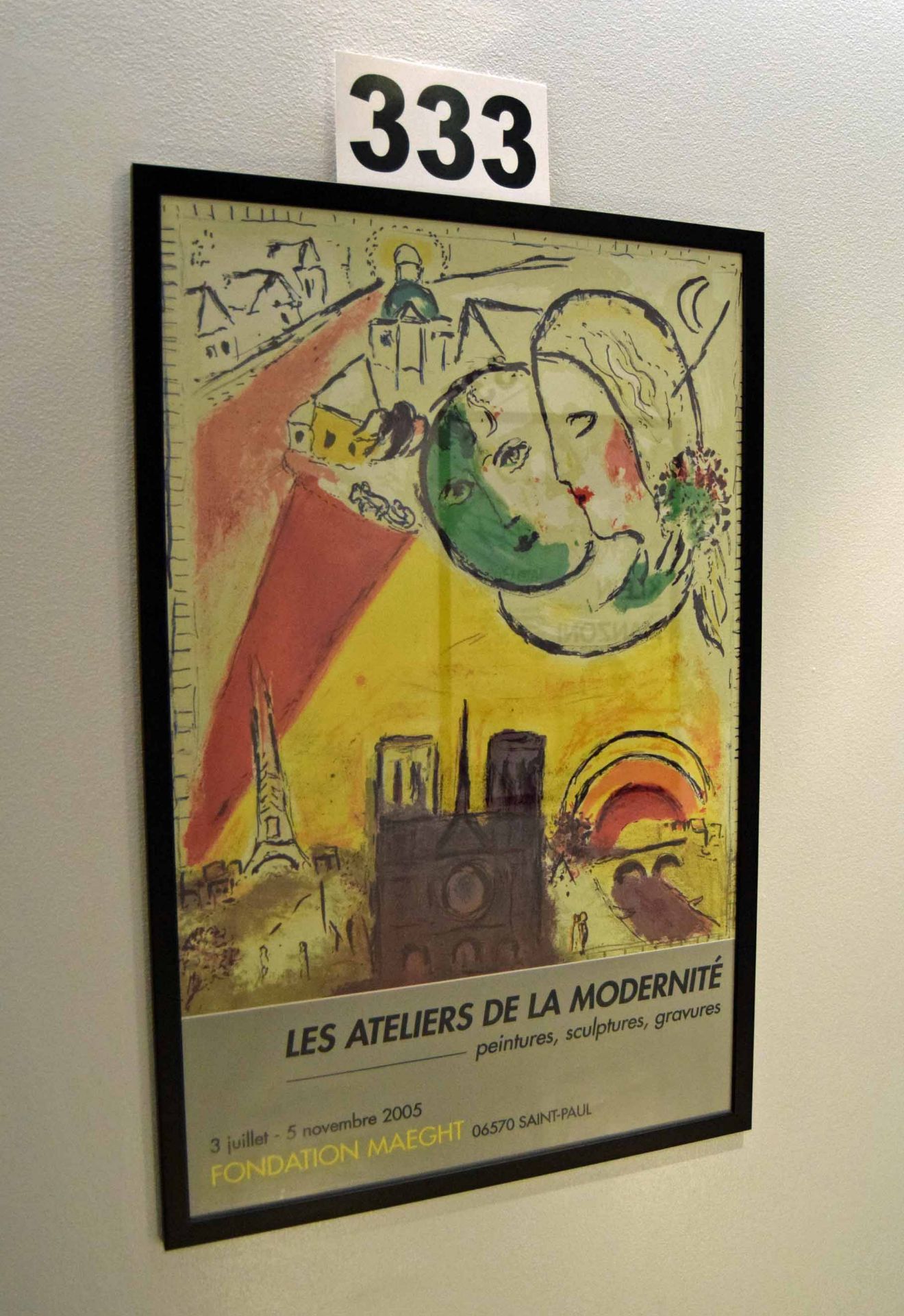 A Wall mounted Framed and Glazed Poster advertising 'Les Ateliers de la Modernite' in Paris France