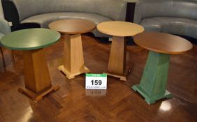 A Set of Four 700mm dia. Circular Topped Timber Pedestal Tables comprising - A Mid Oak Stained