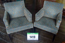 A Pair of Blue and Gold Geometric Patterned Fabric Upholstered Arm Chairs on Black Painted Wooden