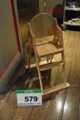 A MOTHERCARE Pine Folding Infants High Chair