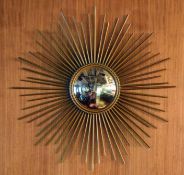 A Wall hung Convex Metal Sunburst Mirror