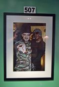 A 1035mm x 780mm Framed and Glazed Colour Photograph of Boy George and Grace Jones