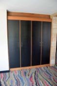 The NOBLE RUSSELL Built-In American Black Walnut 4-Door Wardrobe with Black Finish Embossed Door