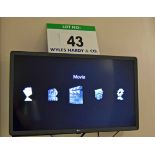 An LG Model 32LK 610BPLB 32 inch Smart Flat Screen Television on An Articulated Wall Bracket