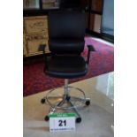 A PARITY Black Leatherette Upholstered Castor mounted Gas Lift Executive Draughtsmans Chair with
