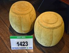 A Pair of Gold Velour Upholstered Barrell Shaped Stools on Black Painted Wooden Base