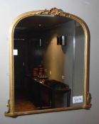 A 1110mm x 1000mm Wall mounted Arch Top Mirror in an Ornate Gilded Frame