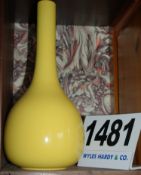 A Yellow Ceramic Bulb Vase