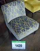 A Grey and Gold Geometric Patterned Velour Fabric Upholstered Salon Chair on Black Painted Timber