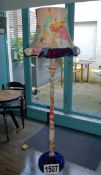 A Wood Framed Patchwork Fabric Clad Floor Lamp with Matching Bell Shade