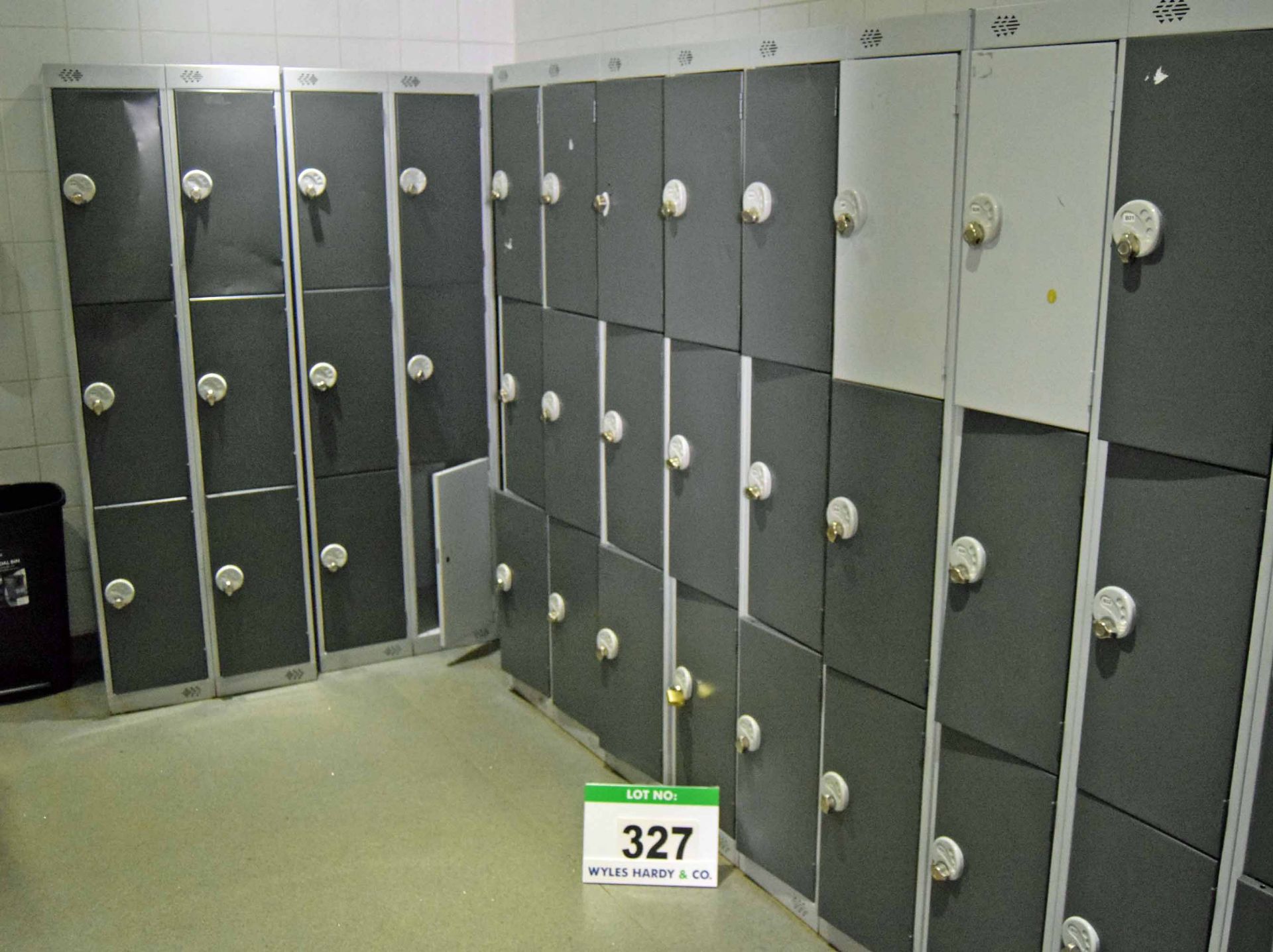 Five Grey Steel 9-Door Personnel Lockers and Three Grey Steel 6-Door Personnel Lockers