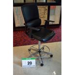 A PARITY Black Leatherette Upholstered Castor mounted Gas Lift Executive Draughtsmans Chair with