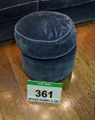 A Blue Velour Upholstered Muffin Top Pouffe