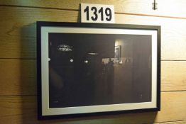 A Framed and Glazed Wall Mounted Black and White Photographic Print Depicting a Live Performance