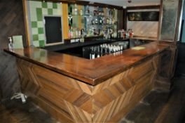 A Built-In 'L' Shaped Bar Having Varnished Oak Top 3285mm x 2375mm (Including Access Flap) with