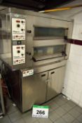 A TOM CHANDLEY Compacta Commercial Twin Door Electric Pizza Oven mounted on a 2-Door Electric Fan