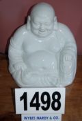A White Ceramic Laughing Seated Bhudda Figurine