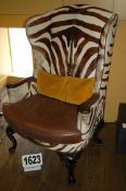 An Imitation Zebra Skin Upholostered Wing Back Arm Chair with Brown Leather Removable Seat Cushion