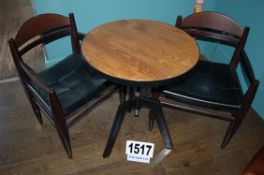 A Circular Plank Topped Height Adjustable Table on Black Painted Fabricated Metal Tripod Frame