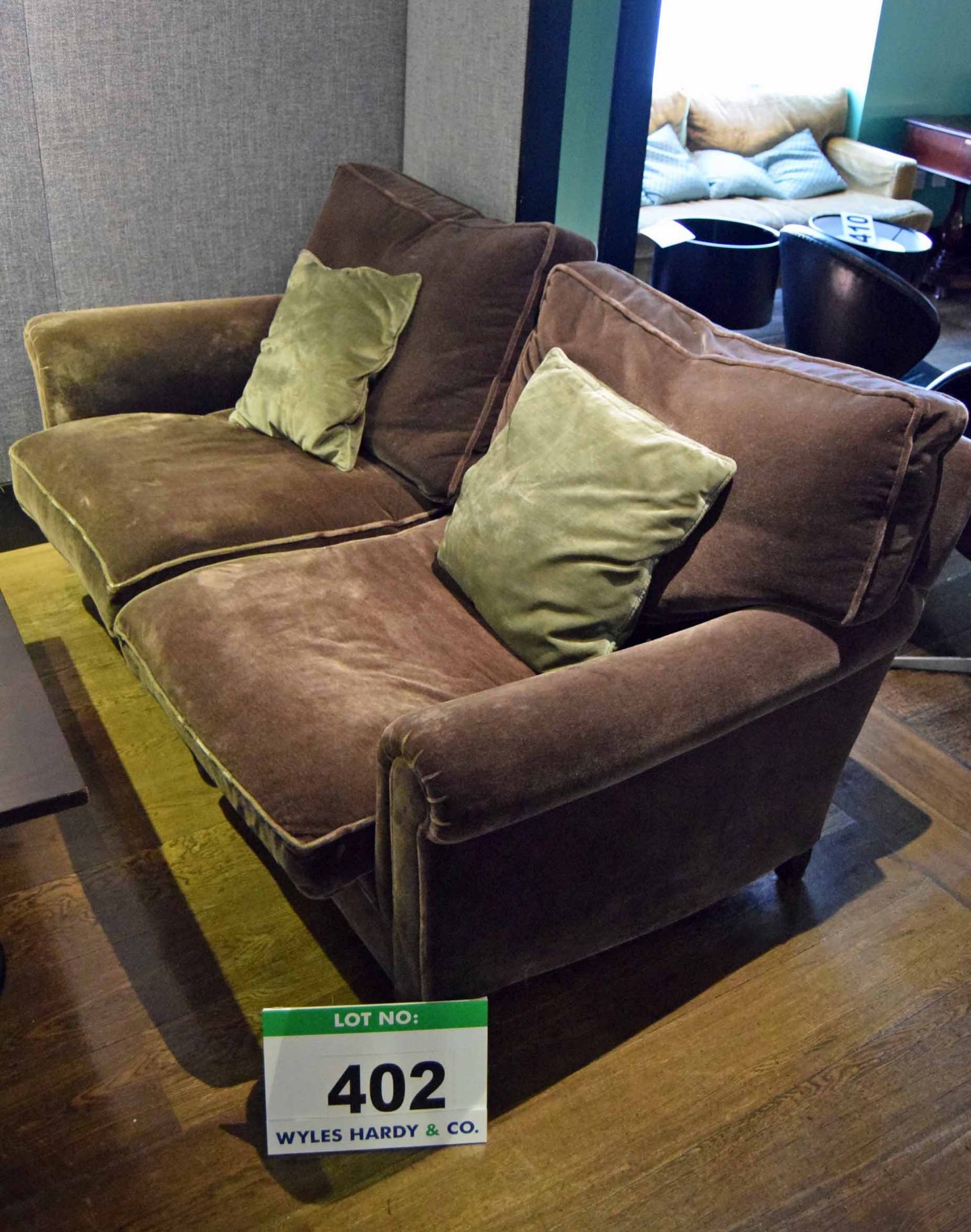 A Brown Velour Upholstered 2-Seater Settee with Removable Back and Seat Cushions and Two Green