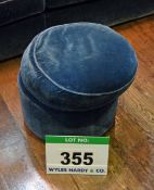 A Blue Velour Upholstered Muffin Top Pouffe