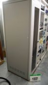 A Grey Steel Glass Fronted 42U 19 Inch Coms Rack Containing a 6-Way Switched 240V AC Power Outlet,