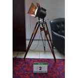 A Freestanding Tripod Light Constructed from a Theatre Lamp with fitted Shutters mounted on a