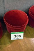 A Red Velour Upholstered Muffin Topped Pouffe