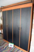 A NOBLE RUSSELL American Black Walnut 4-Door Double Wardrobe with Black Embossed Door Panelling,