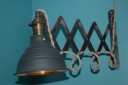 A Black Painted Vintage Wall Light on Hinged Extending Arm with Antique Brass Effect Fittings