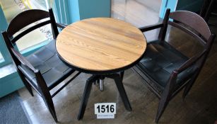 A Circular Plank Topped Height Adjustable Table on Black Painted Fabricated Metal Tripod Frame