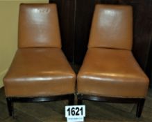 A Pair of Tan Leather Upholstered Salon Chairs on Black Painted Timber Legs