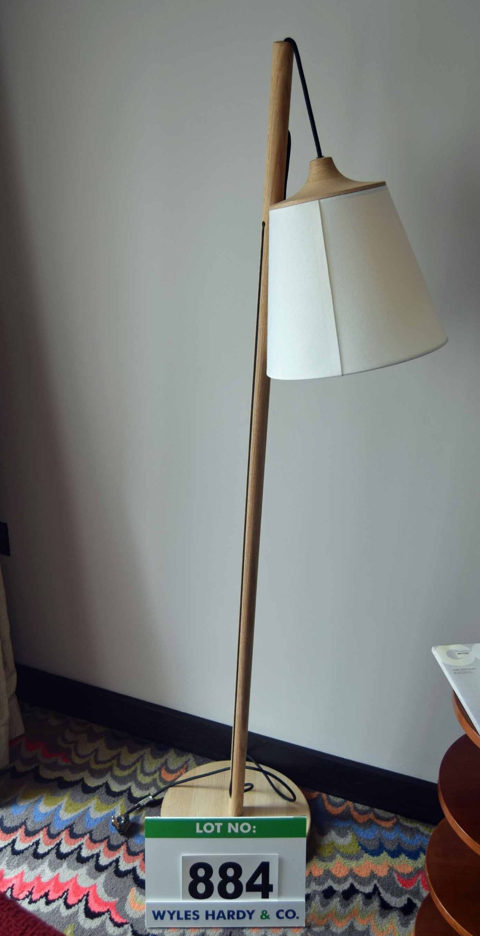 An Ash Framed Hanging Floor Lamp with Cream Fabric Shade