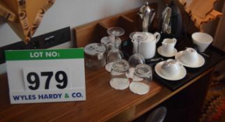 A Black Lacquered Square Tray with ELIA Orientik White Ceramic Teapot and Cream Jug, Two ORION