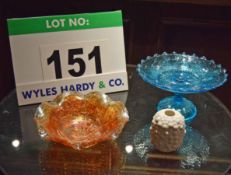 A Metalised Orange Coloured Glass Bowl with Moulded Rose Pattern, a Blue Glass Cake Stand and a