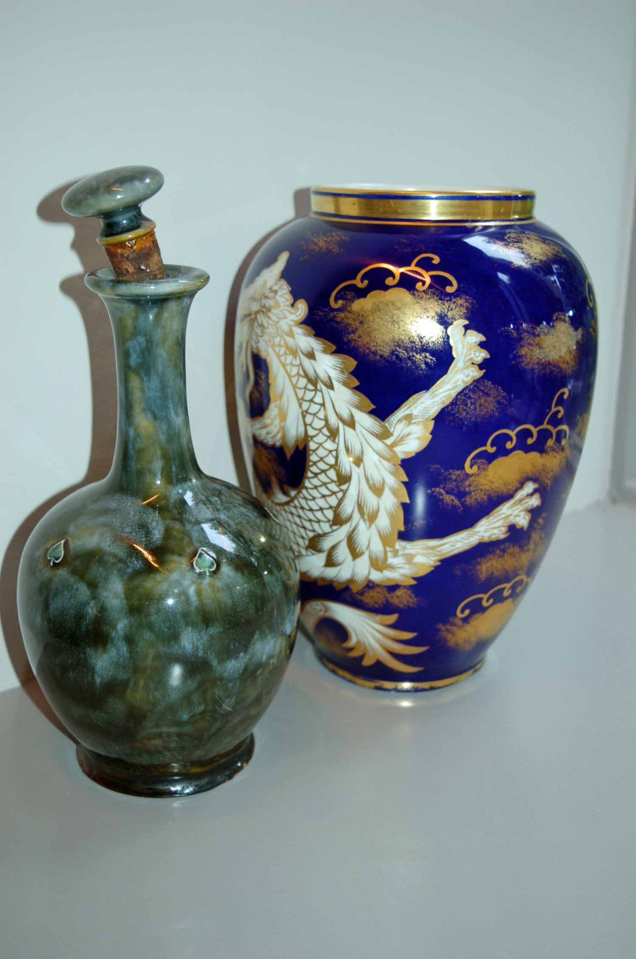 An Oriental Style Urn Shaped Vase and A ROYAL DOULTON Ceramic Decanter with Cork Stopper