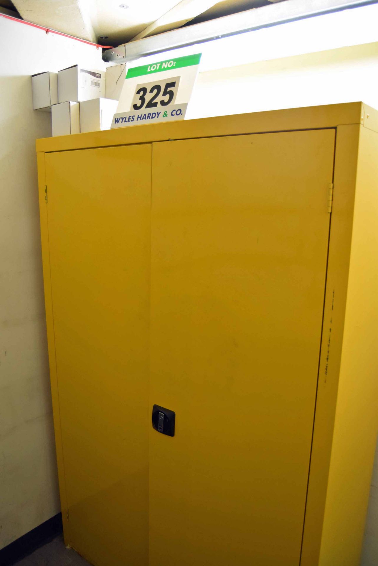 A Yellow Steel Tall Double Door Storage Cabinet and Contents of PPE, Fire Blankets, Cleaning