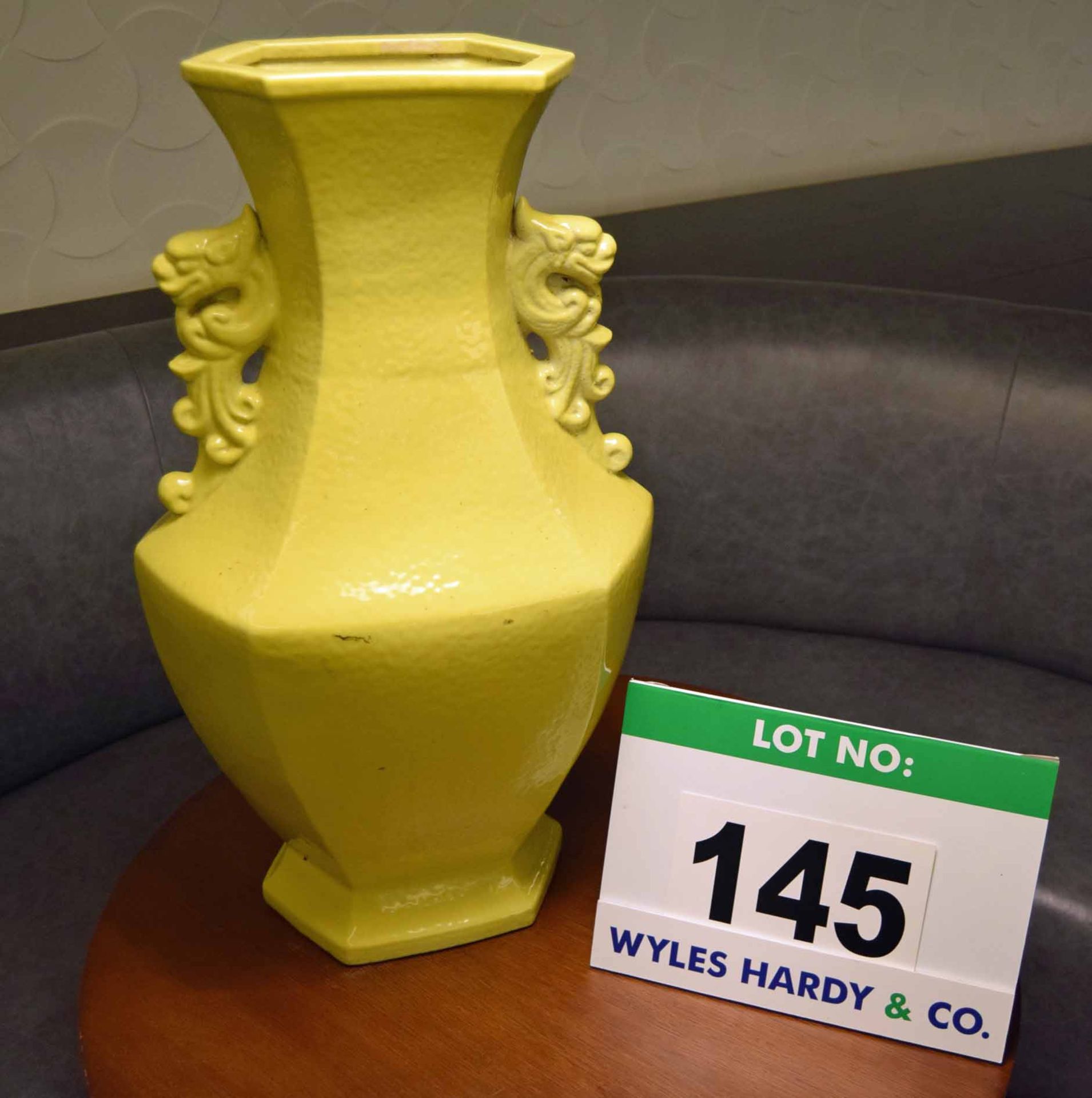 A Yellow Ceramic Vase having Moulded Dragon Head Handles, 620mm tall x 350mm at widest point