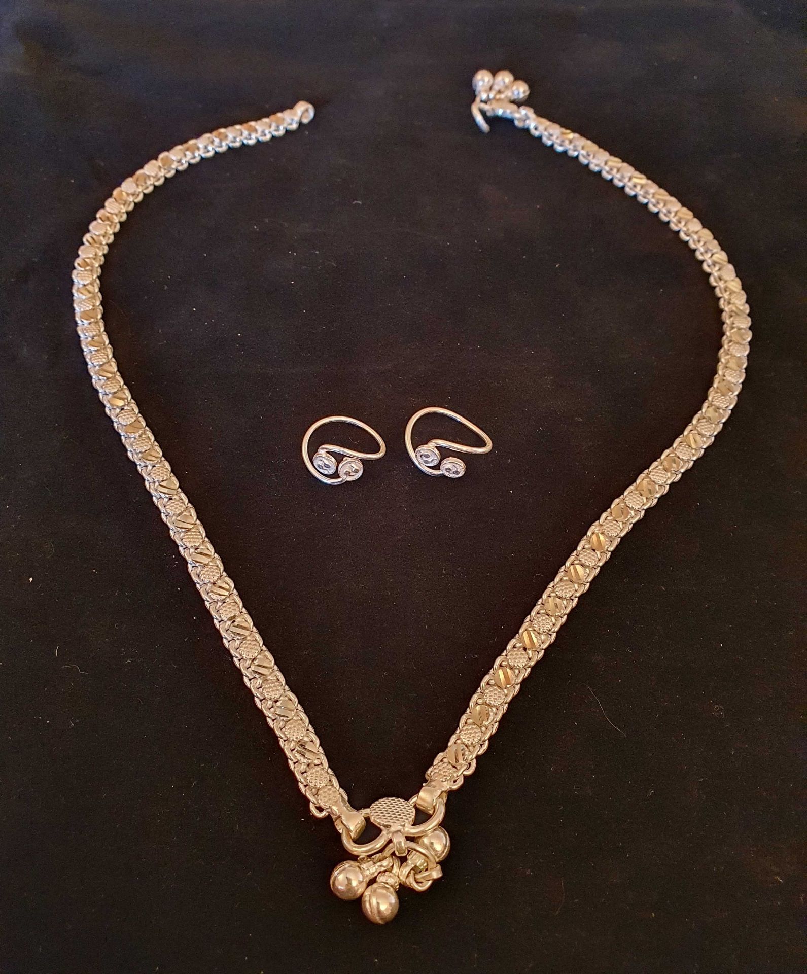 Pair of White Metal Dress Rings and Matching Necklace