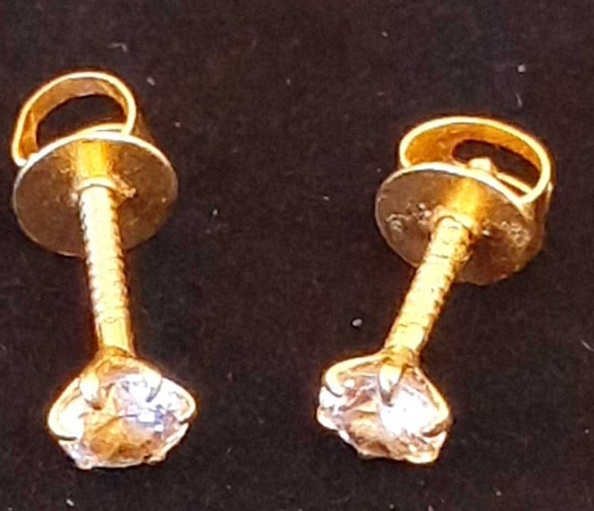 Pair of Clear Stone Stud Earrings with Gold Metal Mounts, 0.580 grams and A Pair of Clear Stone Stud - Image 2 of 4