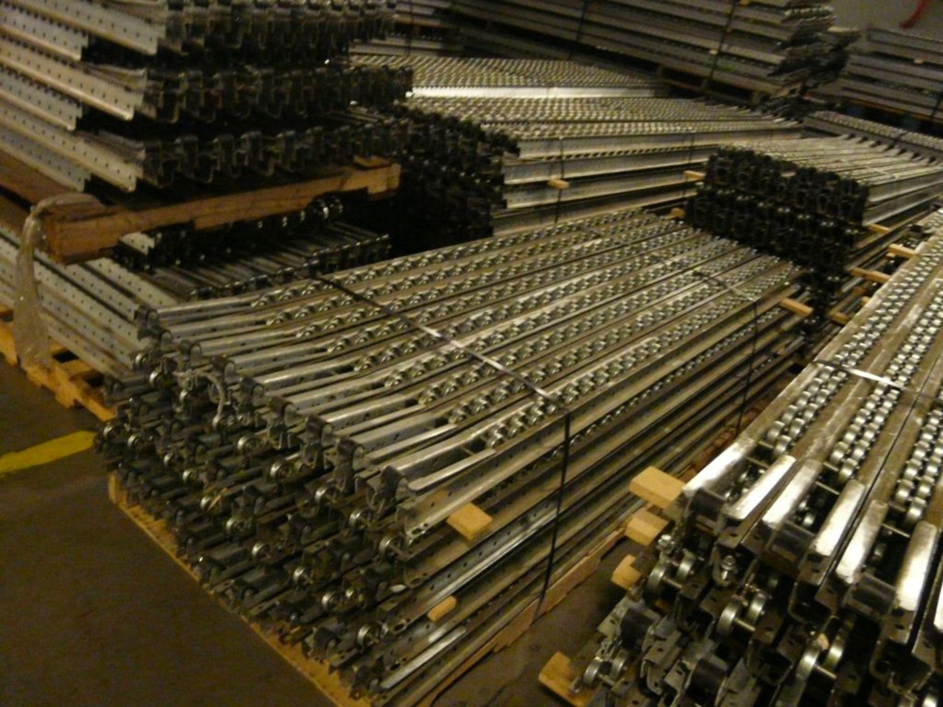 Lot of (2) Bundles of Staggered Metal Wheel Pallet Flow Conveyor Rollers w/Stops - 12.5'L x 4"W; - Image 2 of 5