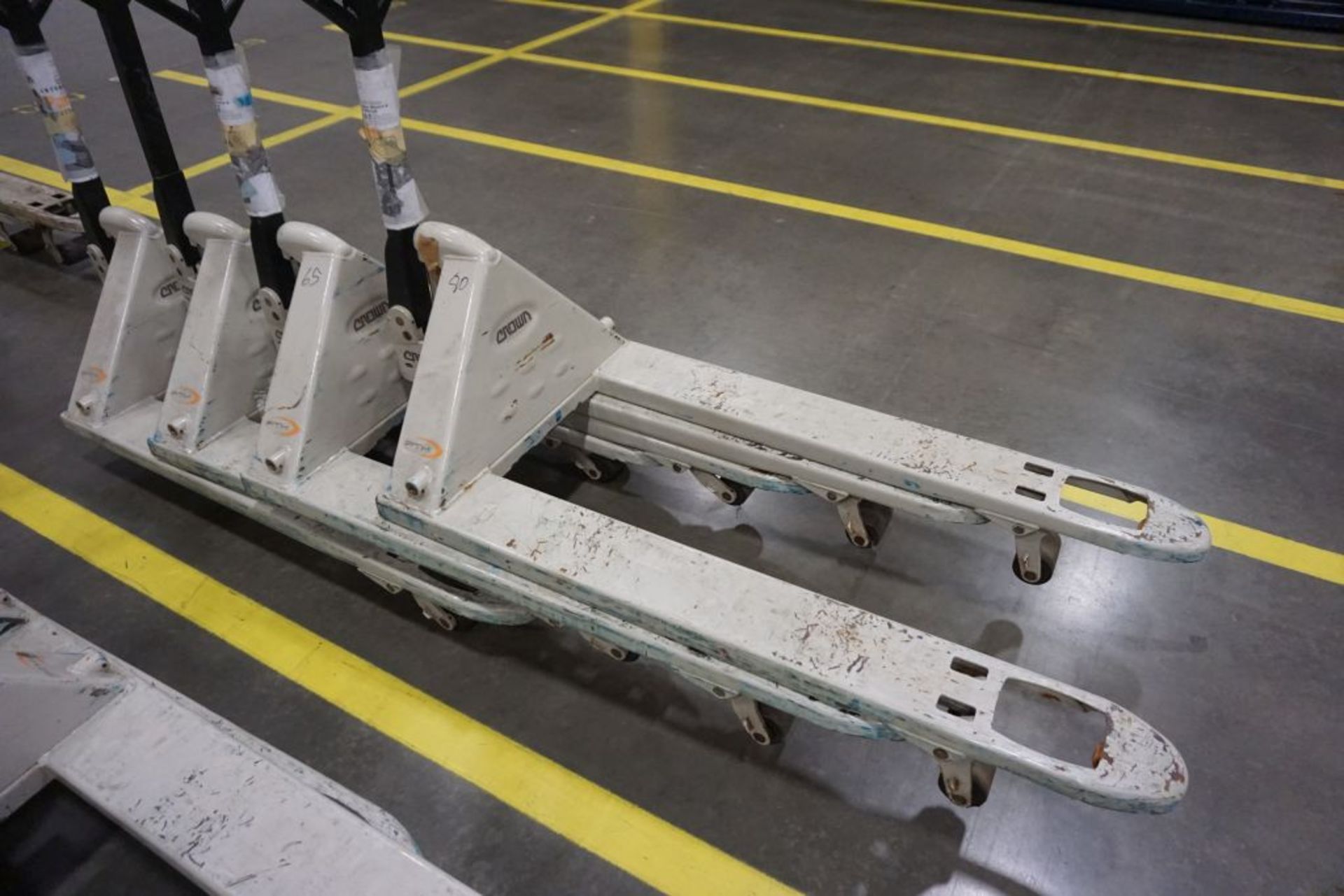 Lot of (4) Crown Pallet Jacks - Model No. PTH50; 5000 lb Capacity; Tag: 218207; Lot Loading Fee: $30 - Image 3 of 4