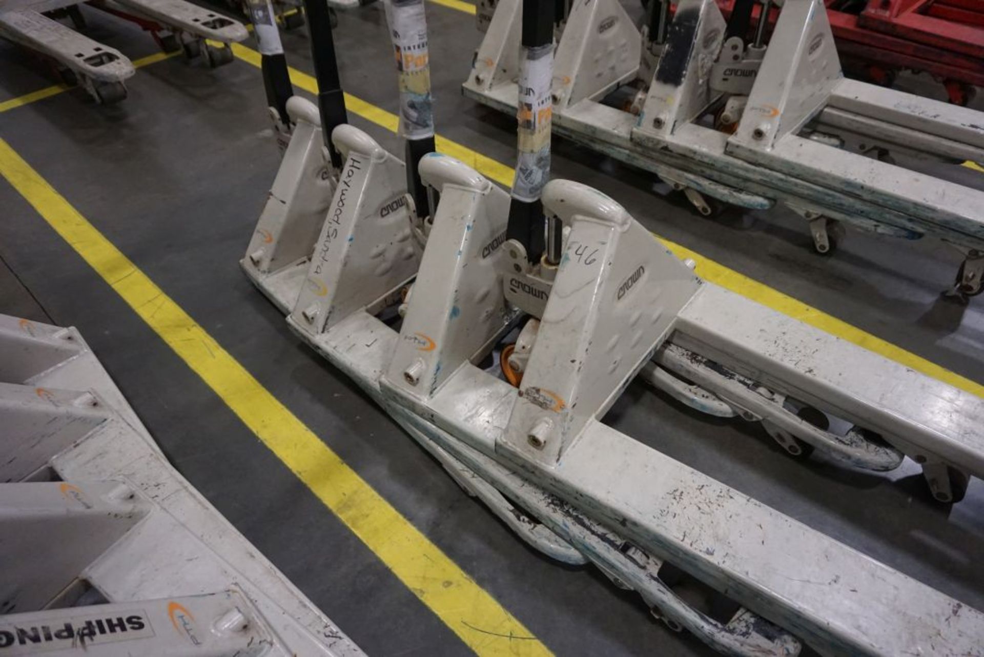 Lot of (4) Crown Pallet Jacks - Model No. PTH50; 5000 lb Capacity; Tag: 218200; Lot Loading Fee: $30 - Image 2 of 4