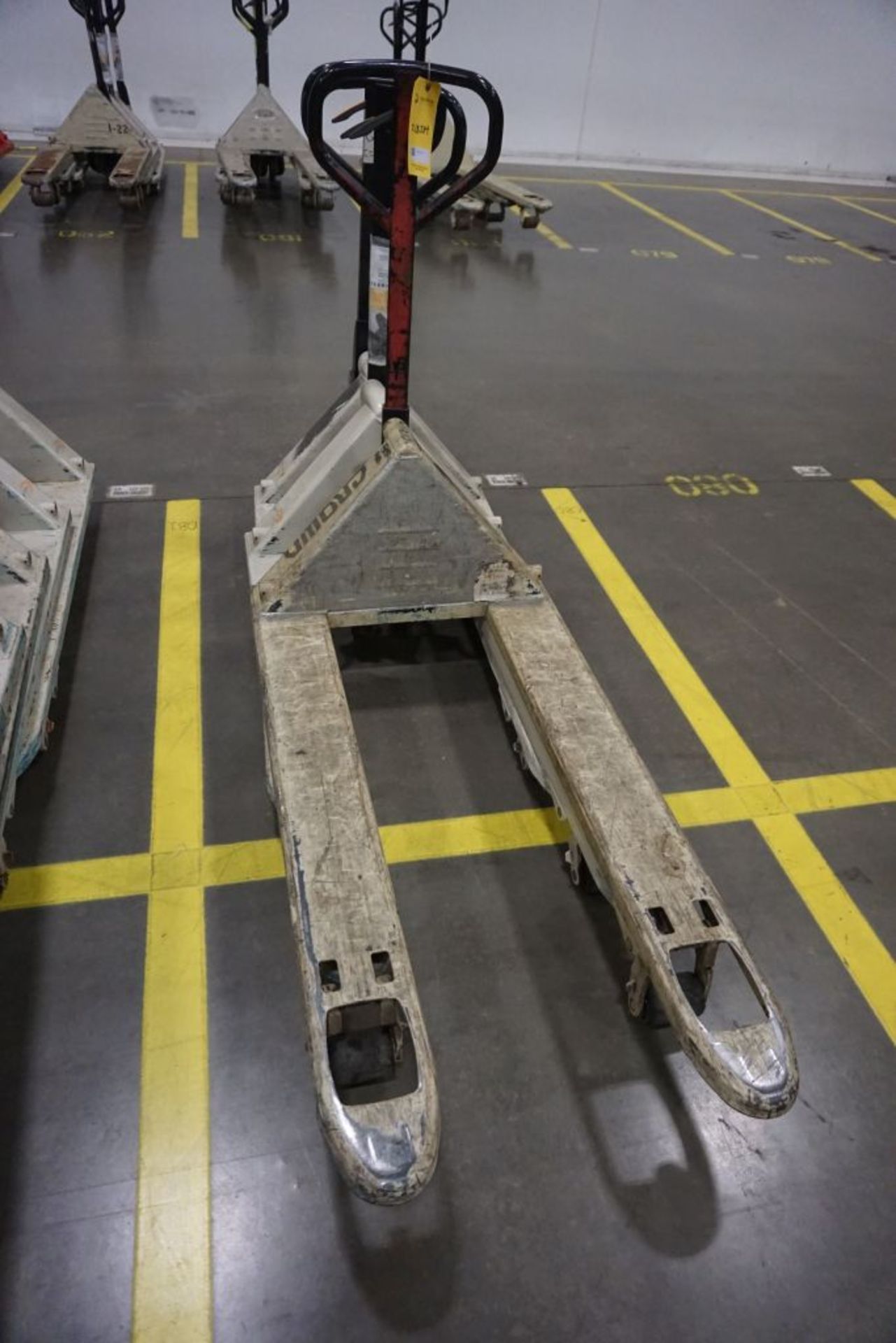 Lot of (3) Crown Pallet Jacks - Model No. PTH50; 5000 lb Capacity; Tag: 218204; Lot Loading Fee: $30