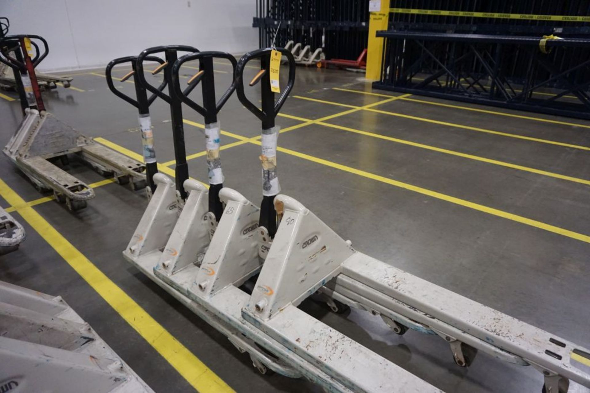 Lot of (4) Crown Pallet Jacks - Model No. PTH50; 5000 lb Capacity; Tag: 218207; Lot Loading Fee: $30 - Image 2 of 4